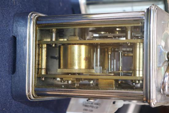 A French silvered brass carriage clock and a similar timepiece